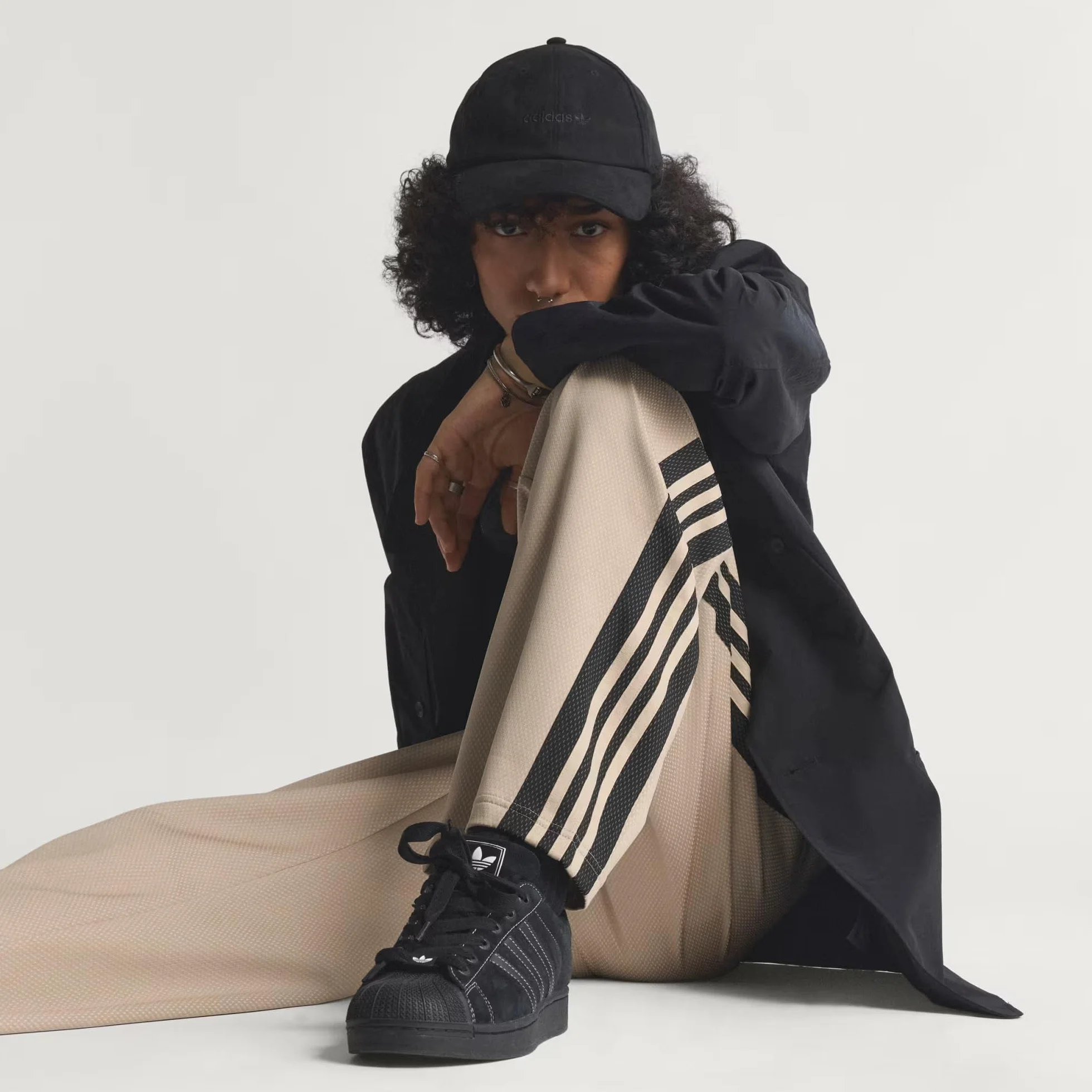 adidas Pantalones de chándal para hombre de malla holgada