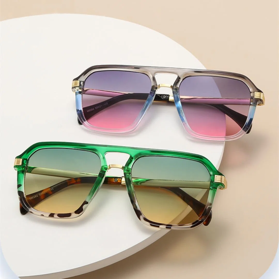 Gafas de sol vintage con doble puente y lentes degradadas UV400, ideales para exteriores y a la moda.
