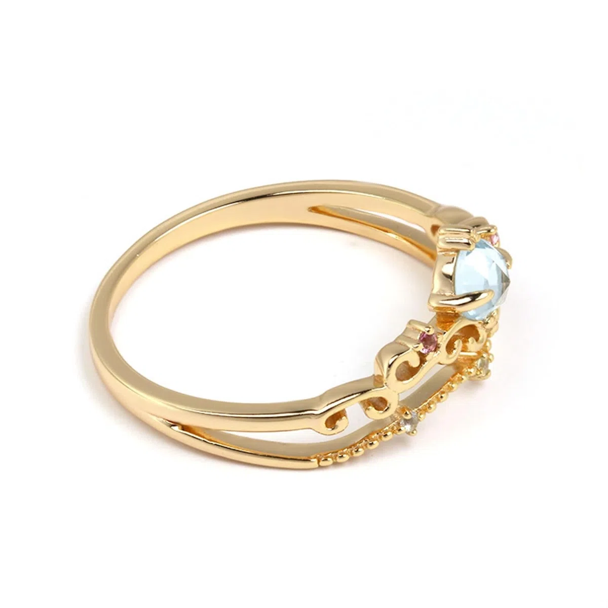 Anillo solitario de oro Au 375/585/750 con topacio azul claro, forma de vid