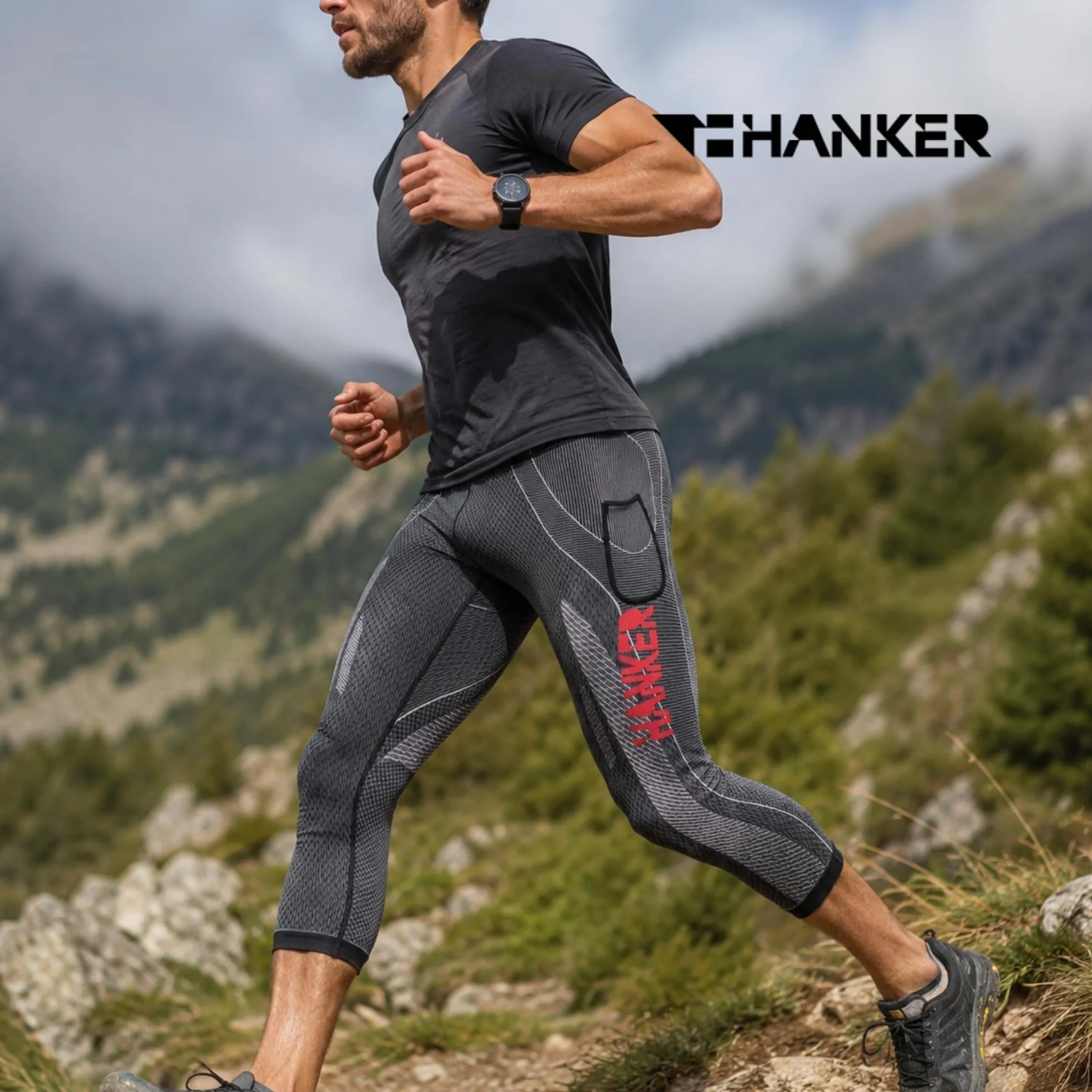 HANKER Mallas de Compresión 3/4 Hombre Running Trail Fitness Bolsillos Grandes Costuras Planas