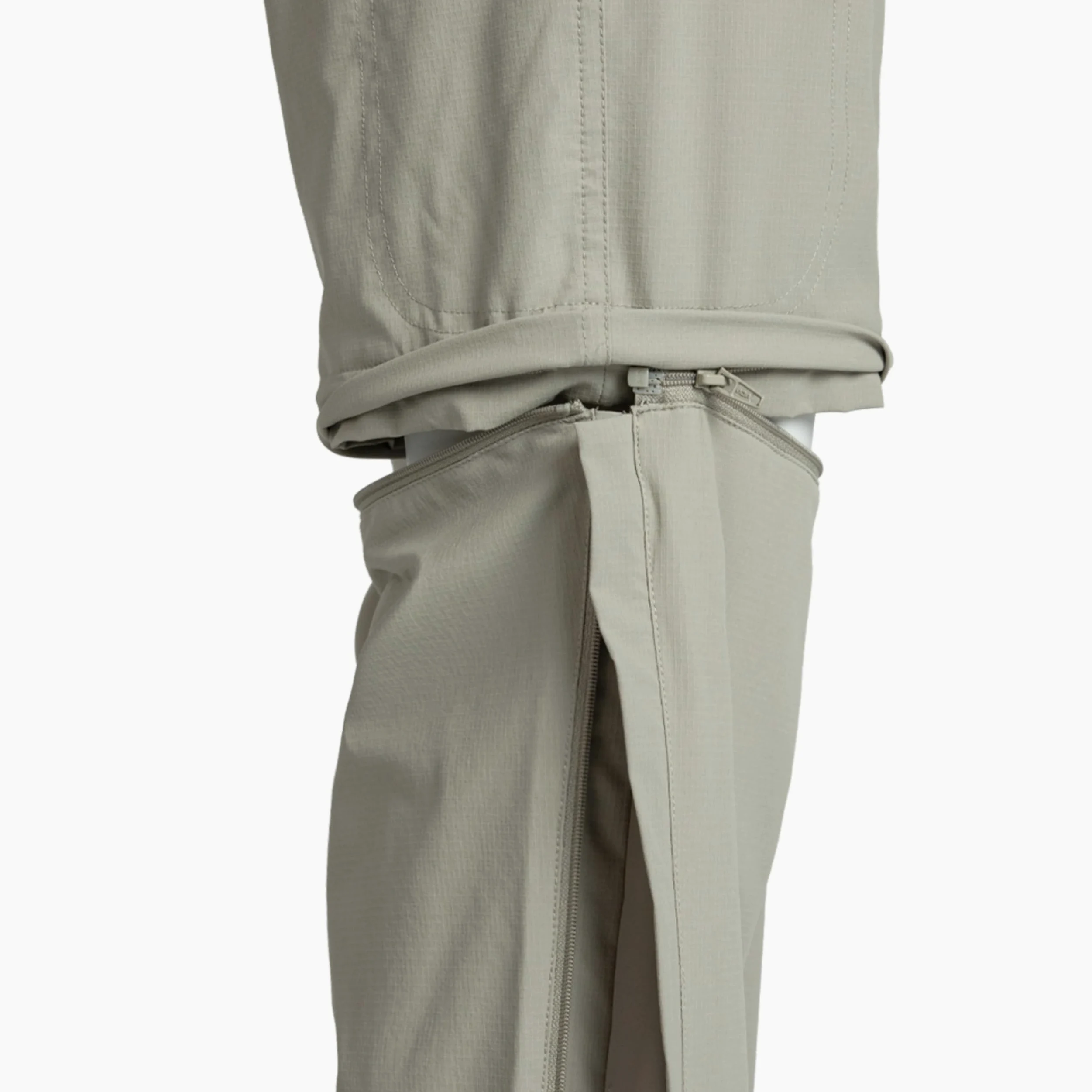 Izas Arezzo Pantalón Comprimible Ribstop para Mujer. Elástico, Duradero y Repelente al Agua. Transpirable y de Secado Rápido. Desmontable. con Bolsillos, Ajustable y Cómodo