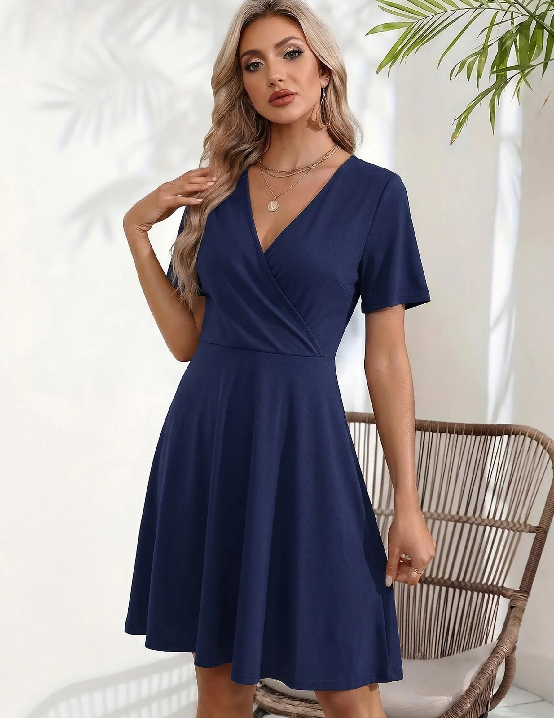 Zeagoo Vestido de verano para mujer cuello de pico manga corta estampado floral con bolsillos volantes mangas envolventes S-XXL