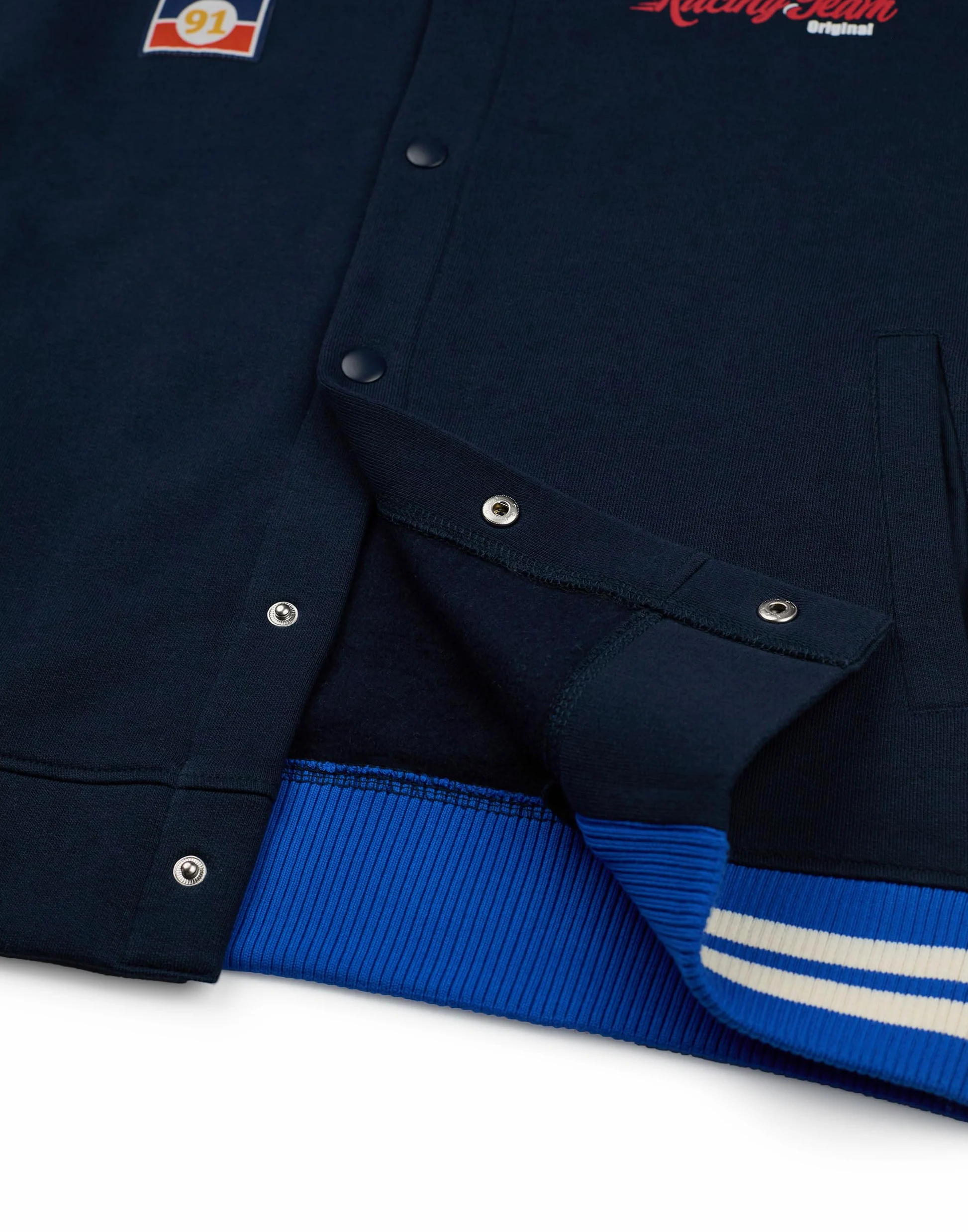 Sonic The Hedgehog Chaqueta bomber para niños| Chaqueta universitaria Sonic Racing Team para niños en Azul | Chaqueta de béisbol con cremallera y estampado de bandera a cuadros del personaje Sonic